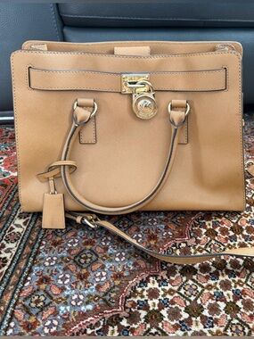 Michael Kors Camel Saffiano Satchel with Gold-Tone Hardware.